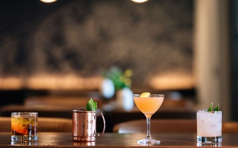 a two glasses of liquid on a table main