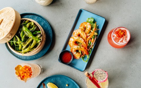 a plate of food and drinks on a table