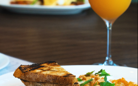 a plate of food and a drink