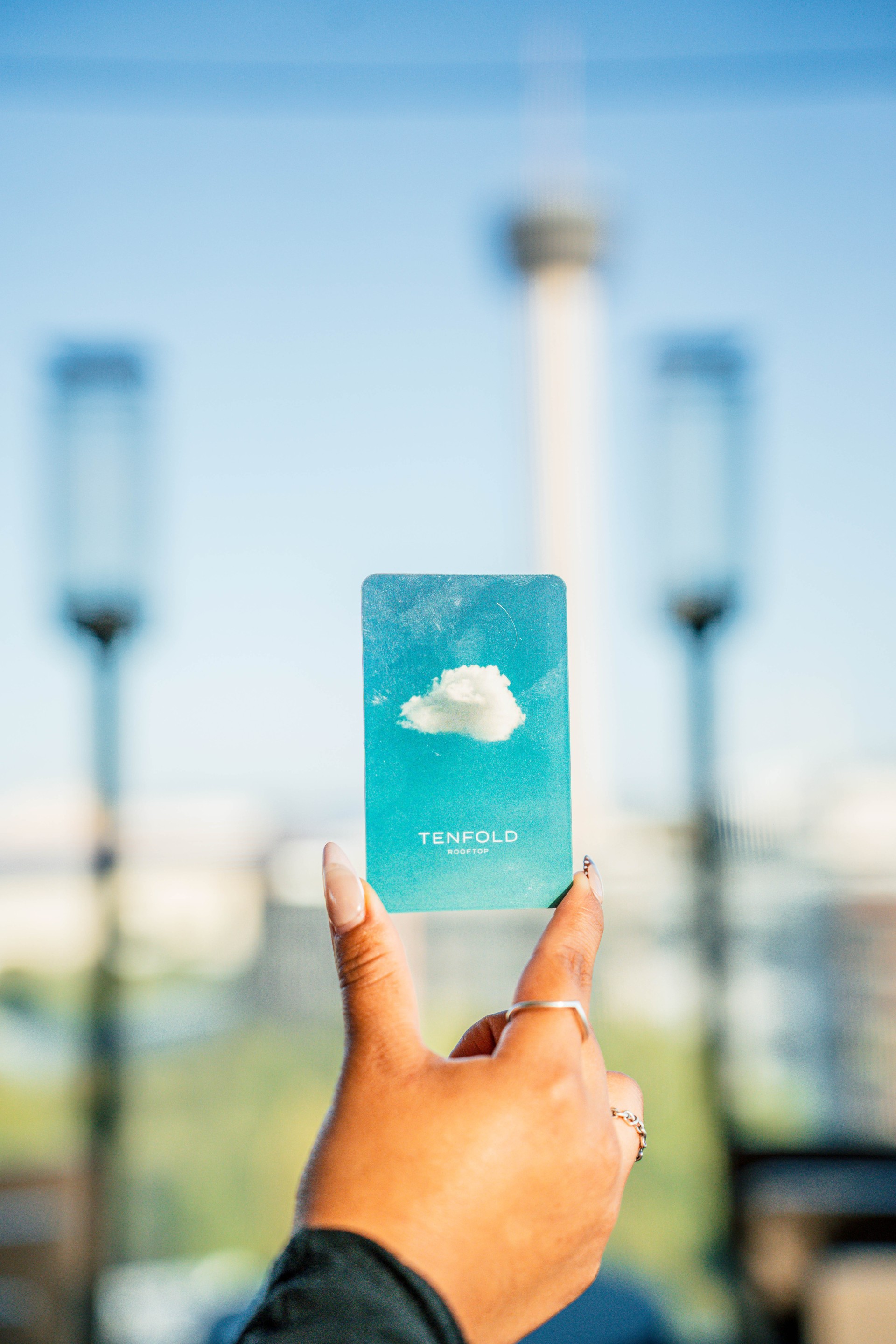 a hand holding a card