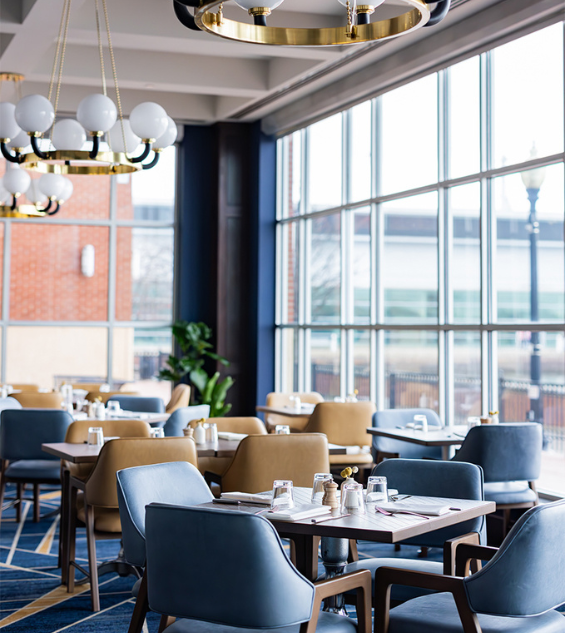 a restaurant with tables and chairs