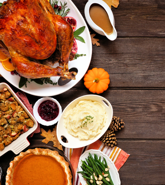 a turkey on a table with different foods