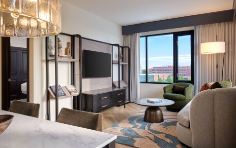 a living room with a tv and a table
