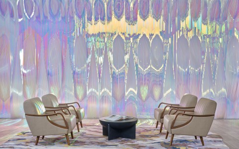 a room with chairs and a table