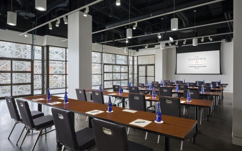 a room with tables and chairs