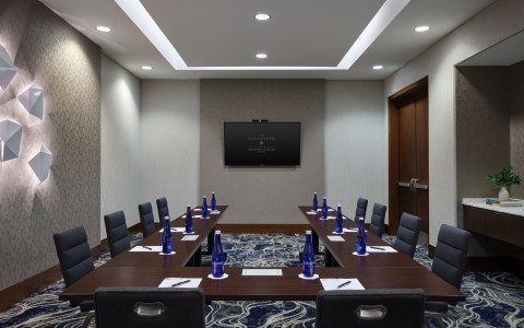 a room with a table and chairs
