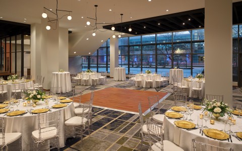 a room with tables and chairs