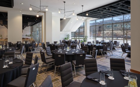 a room with tables and chairs