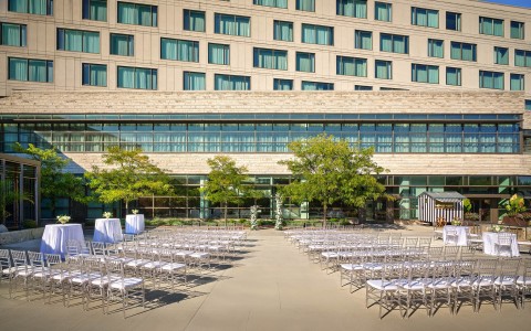 a group of chairs outside of a building
