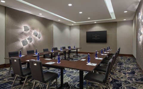 a room with a table and chairs
