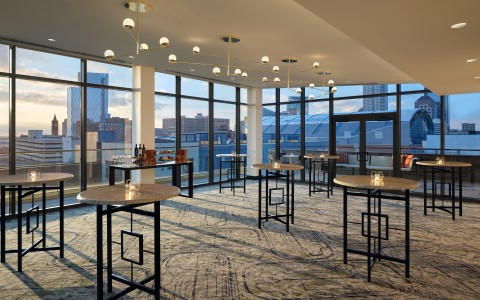 a room with tables and chairs