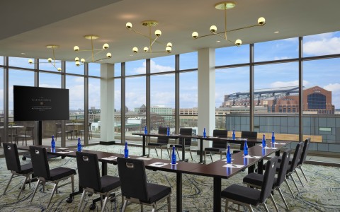a room with a large table and chairs