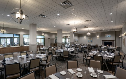 a room with tables and chairs