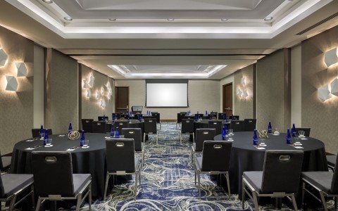 a room with tables and chairs