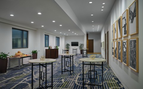 a room with tables and chairs