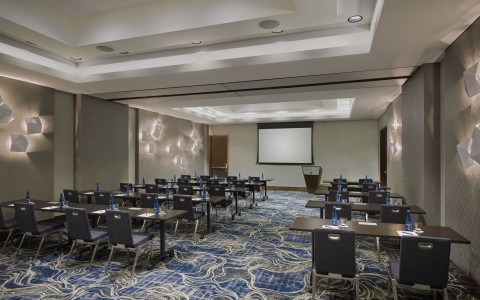 a room with tables and chairs