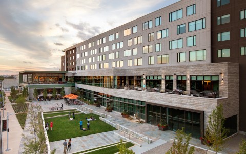 a building with many windows and a courtyard