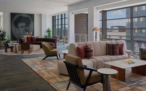 a room with couches and chairs