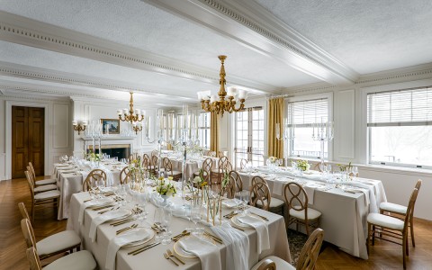 a room with tables and chairs