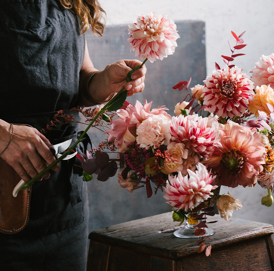 a person holding a flower