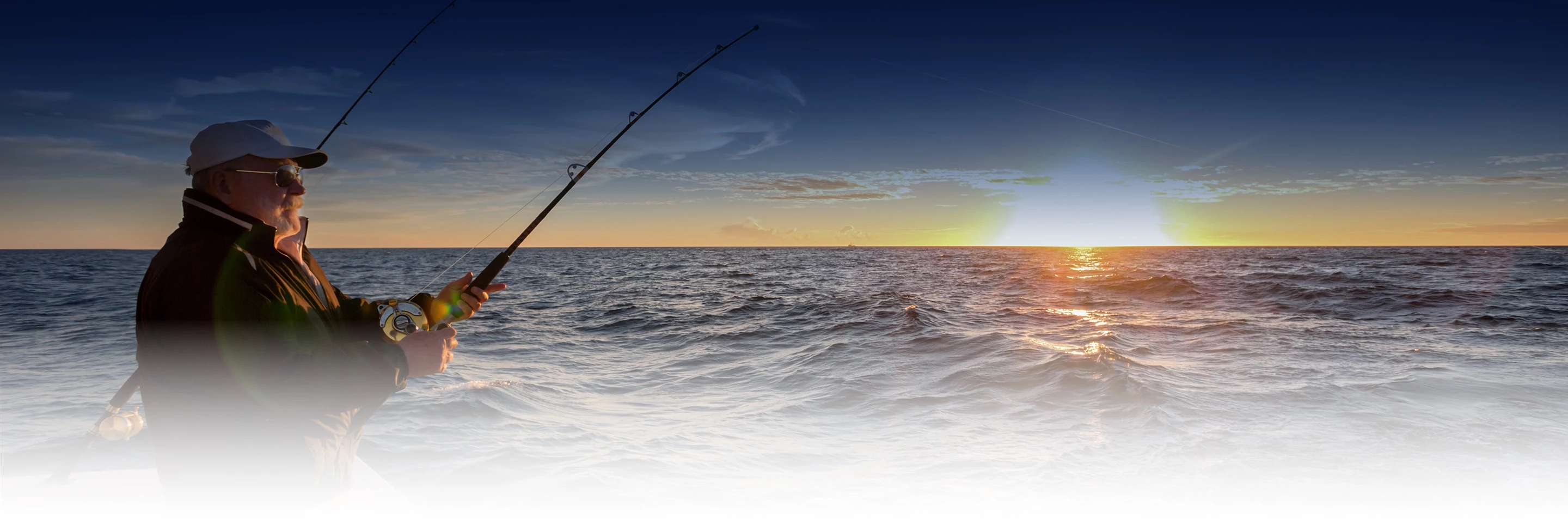a man fishing in the water