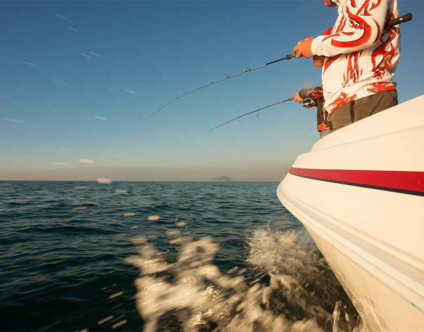 a group of people fishing on a boat