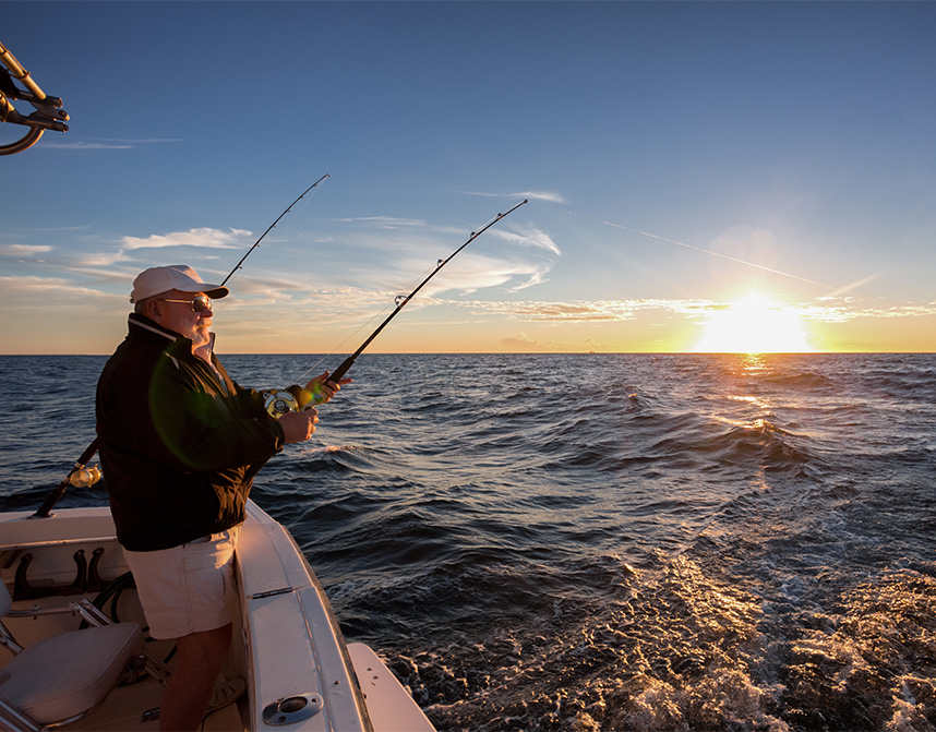 a man fishing on a boat