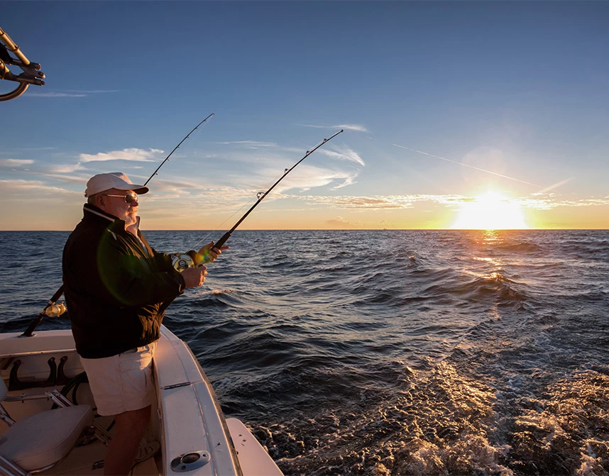 a man fishing on a boat