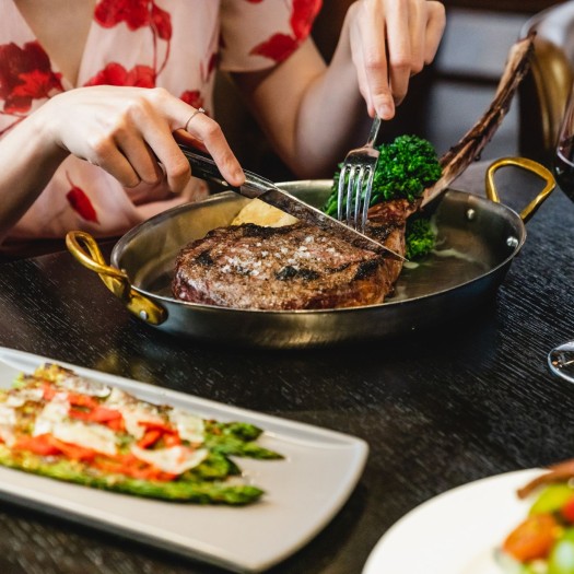 a woman eating a meal
