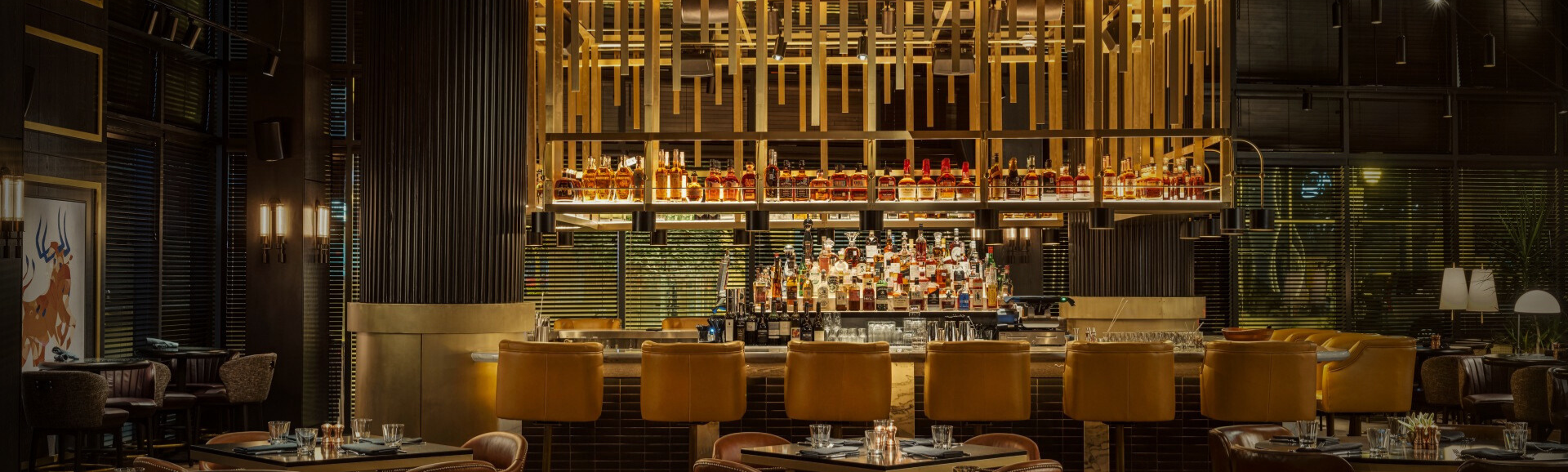 a bar with bottles of alcohol