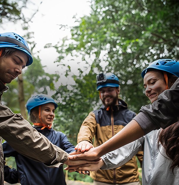 a group of people wearing helmets