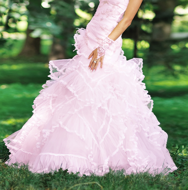 a woman in a pink dress