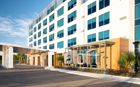 a large white building with a sign on the front