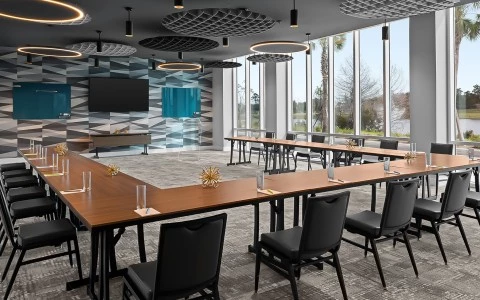 a conference room with a large table and chairs