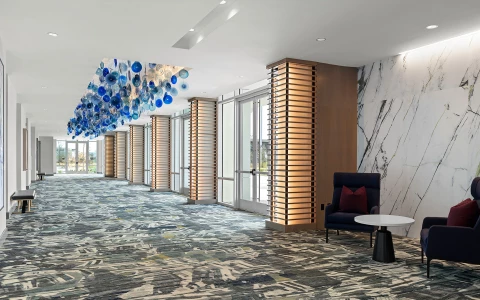 a room with a marble floor and a blue chair