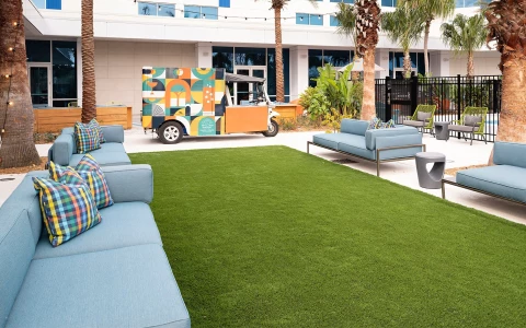 a couches and chairs outside a building