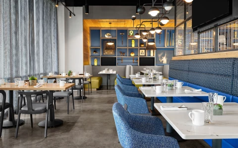 a restaurant with tables and chairs