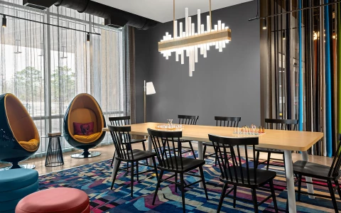 a room with a table and chairs