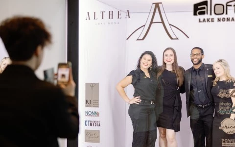 a group of people posing for a photo