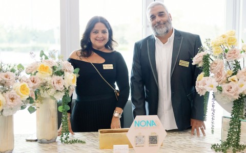 a man and woman standing next to each other