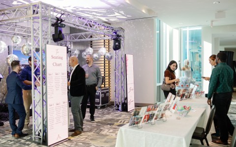 a group of people standing in a room