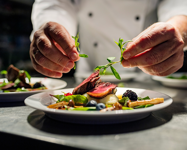 chef zaner preparing food 