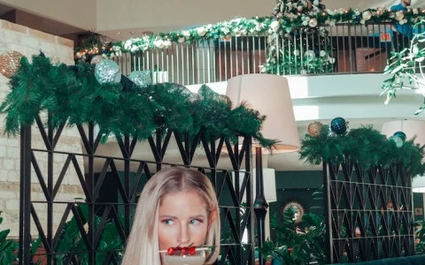 girl drinking in lobby bar