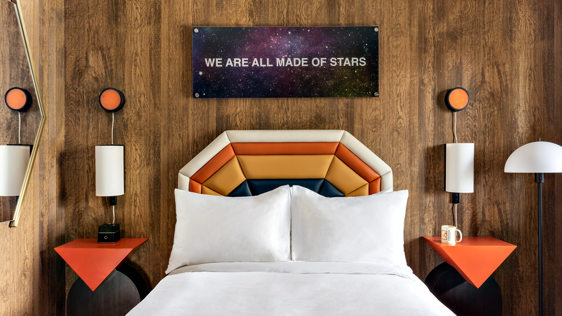 a bed with a white bed spread