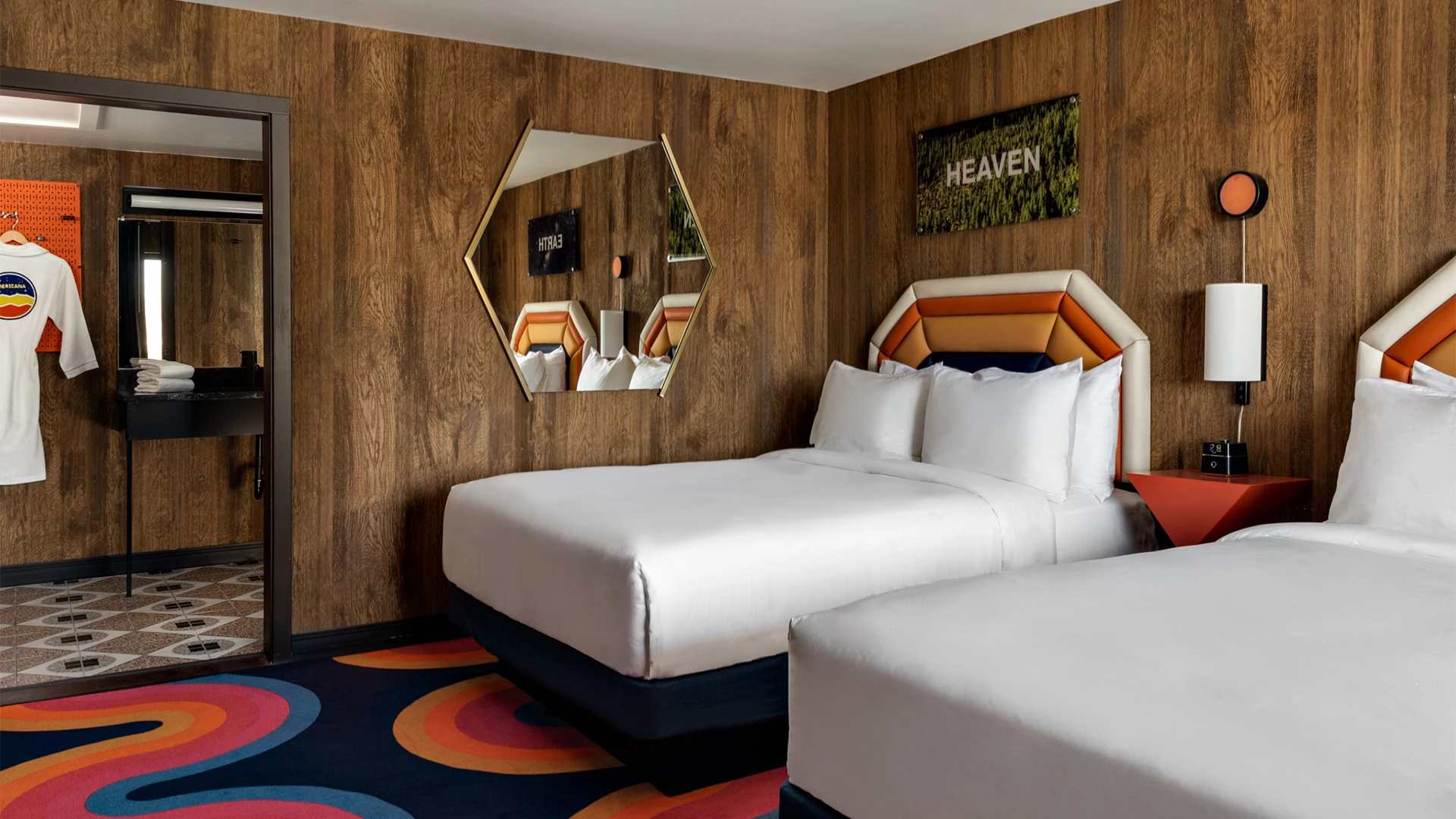 a hotel room with two beds