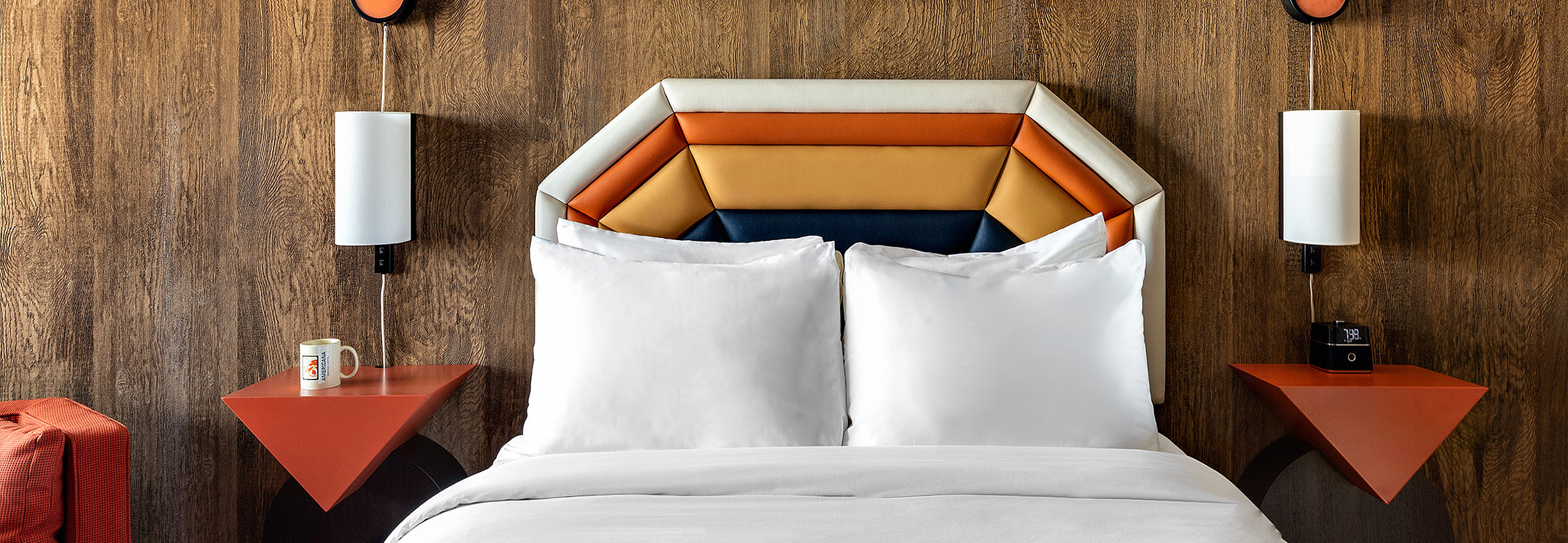 a bed with a white bed spread