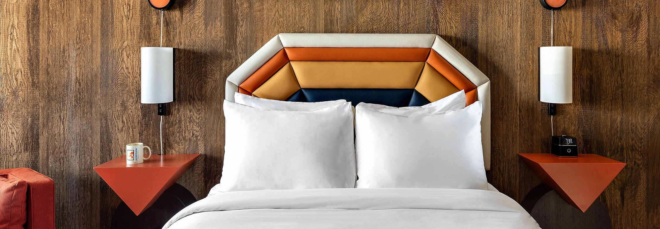 a bed with a white bed spread