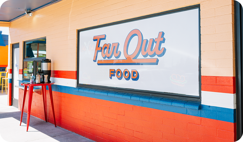 a woman standing in front of a store