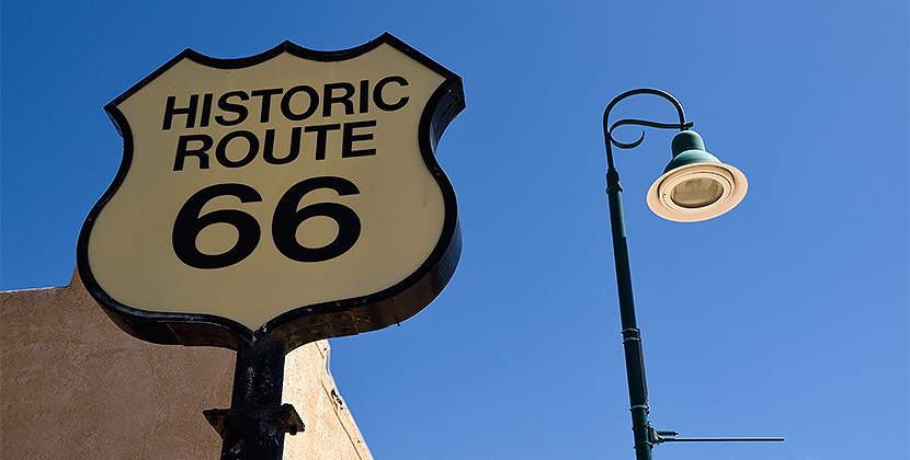 a sign and a lamp post