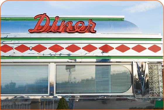 a red and green diner sign